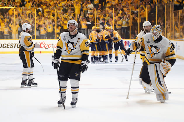 NASHVILLE, TN – JUNE 05: Phil Kessel #81, Sidney Crosby #87 and Matt Murray #30 of the Pittsburgh Penguins react as Filip Forsberg #9 of the Nashville Predators celebrates with his teammates after scoring an open net goal against the Pittsburgh Penguins during the third period in Game Four of the 2017 NHL Stanley Cup Final at the Bridgestone Arena on June 5, 2017 in Nashville, Tennessee. (Photo by Justin K. Aller/Getty Images)