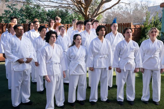 <p>Curtis Bonds Baker/Netflix</p> Khalil Everage, Nathaniel Oh, Griffin Santopietro, Owen Morgan, Mary Mouser, Aedin Mincks, Gianni DeCenzo, Xolo Maridueña, Jacob Bertrand, Tanner Buchanan, and Peyton List suit up in 'Cobra Kai'