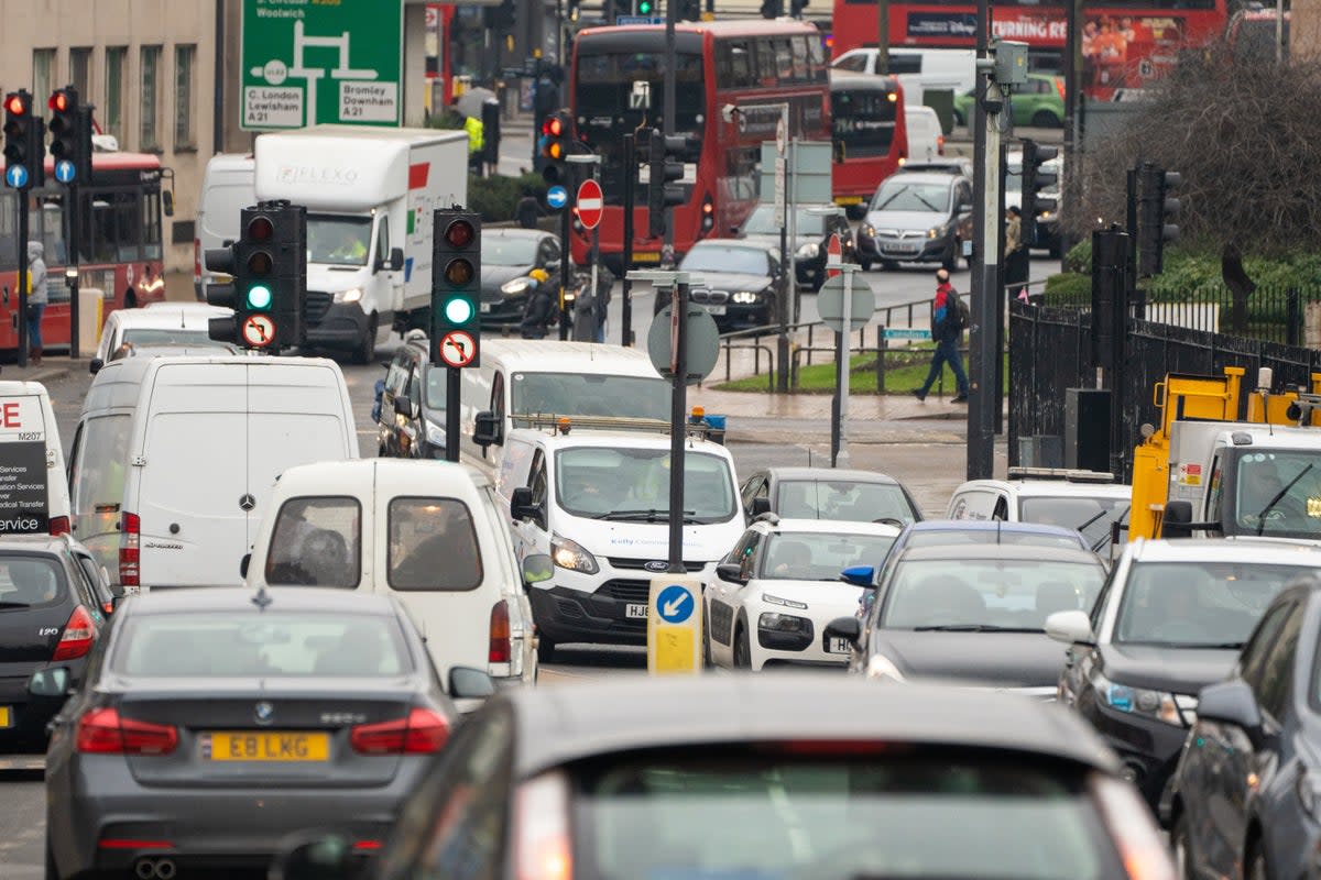 Vehicles queuing in heavy traffic in London  (PA Archive)