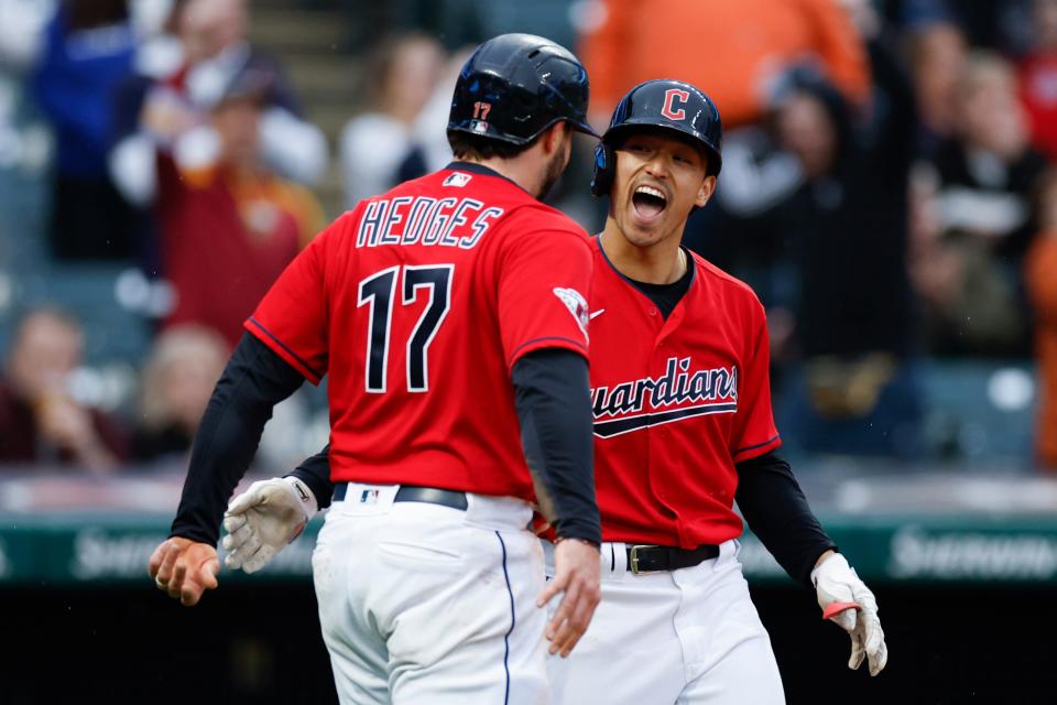 Outfielder Steven Kwan, right, has brought high energy and an elite contact hitter to the Guardians' lineup. He has also made chess the game of choice in the clubhouse. [Ron Schwane/Associated Press]