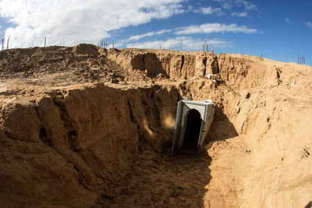 An entrance to what the Israeli military say is a cross-border attack tunnel dug from Gaza to Israel, is seen on the Israeli side of the Gaza Strip border near Kissufim January 18, 2018. REUTERS/Jack Guez/Pool