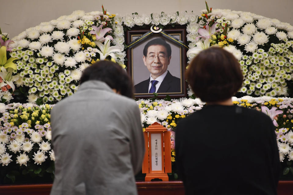 In this photo provided by Seoul Metropolitan Government, a portrait of the deceased Seoul Mayor Park Won-soon is placed at a hospital in Seoul, South Korea, Friday, July 10, 2020. Park left a note saying he felt “sorry to all people” before he was found dead early Friday, officials in the South Korean capital said as people began mourning the liberal legal activist seen as a potential presidential candidate. (Seoul Metropolitan Government via AP)