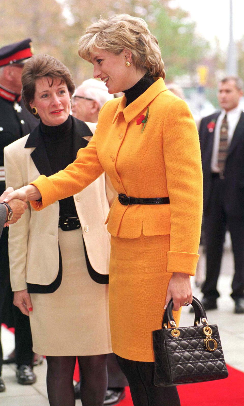 LIVERPOOL, UNITED KINGDOM - NOVEMBER 07:  Princess Diana Arriving At The Liverpool Women's Hospital, Merseyside. She Is Wearing A Suit Designed By Fashion Designer Versace  (Photo by Tim Graham Photo Library via Getty Images)