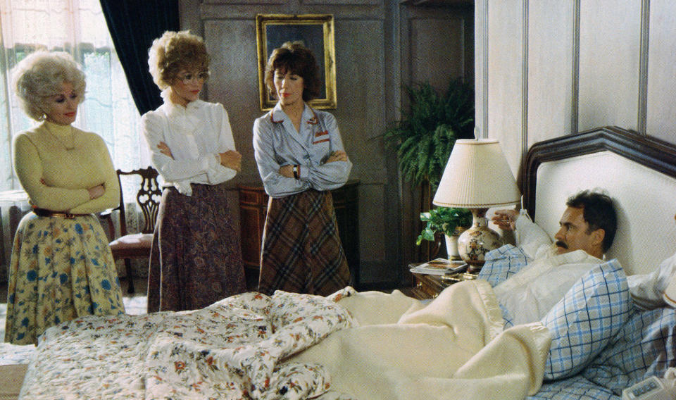 (Left to right): Dolly Parton, Jane Fonda, Lily Tomlin, and Dabney Coleman in “9 to 5” - Credit: ©20thCentFox/Courtesy Everett Collection