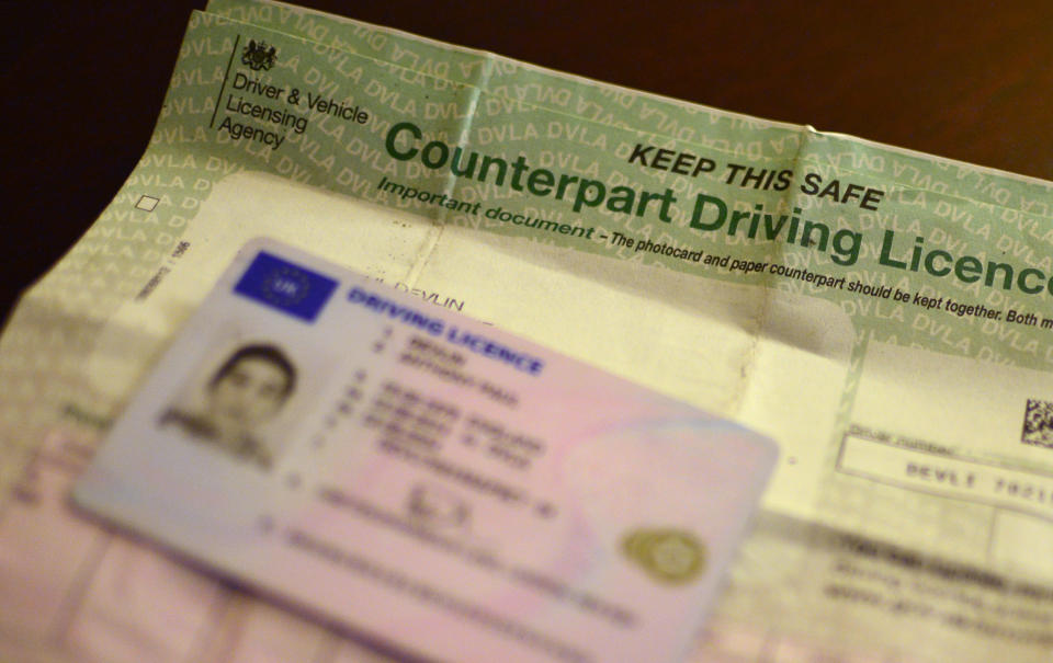 A photocard driving licence and its old style paper counterpart (PA)