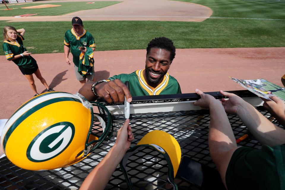 Former Green Bay Packers Greg Jennings signs an autograph for fans during the Donald Driver Charity Softball Game Sunday, August 22, 2021, at Neuroscience Group Field at Fox Cities Stadium in Grand Chute, Wis. Dan Powers/USA TODAY NETWORK-Wisconsin