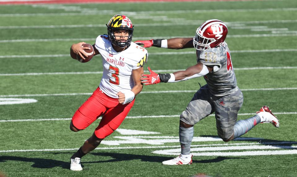 BLOOMINGTON, INDIANA - NOVEMBER 28:  Taulia Tagovailoa #3 of the Maryland Terrapins runs with the ball against the Indiana Hoosiers during the game at Memorial Stadium on November 28, 2020 in Bloomington, Indiana. (Photo by Andy Lyons/Getty Images)