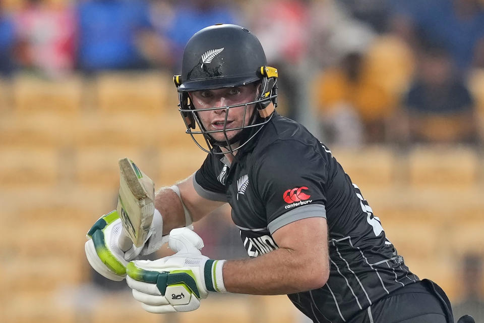 New Zealand's Tom Latham watches his shot during the ICC Cricket World Cup match between Afghanistan and New Zealand in Chennai, India, Wednesday, Oct. 18, 2023. (AP Photo/Eranga Jayawardena)