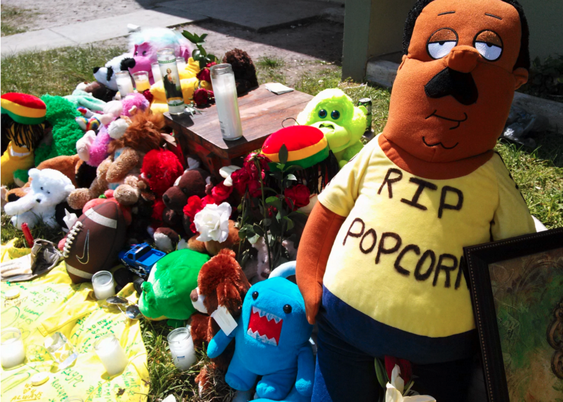 A memorial for Joewaun “Popcorn” Coles, just steps away from where he was killed on Northwest 75th Street and 16th Avenue.