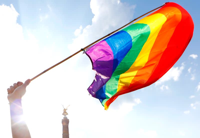 A rainbow flag is seen in front of the the Berlin Victory Column during the annual Gay Pride parade, also called Christopher Street Day parade (CSD), in Berlin,