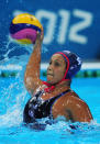 LONDON, ENGLAND - JULY 30: Brenda Villa of the United States looks for a pass during the Women's Water Polo Preliminary match between Hungary and the United States on Day 3 of the London 2012 Olympic Games at Water Polo Arena on July 30, 2012 in London, England. (Photo by Stu Forster/Getty Images)