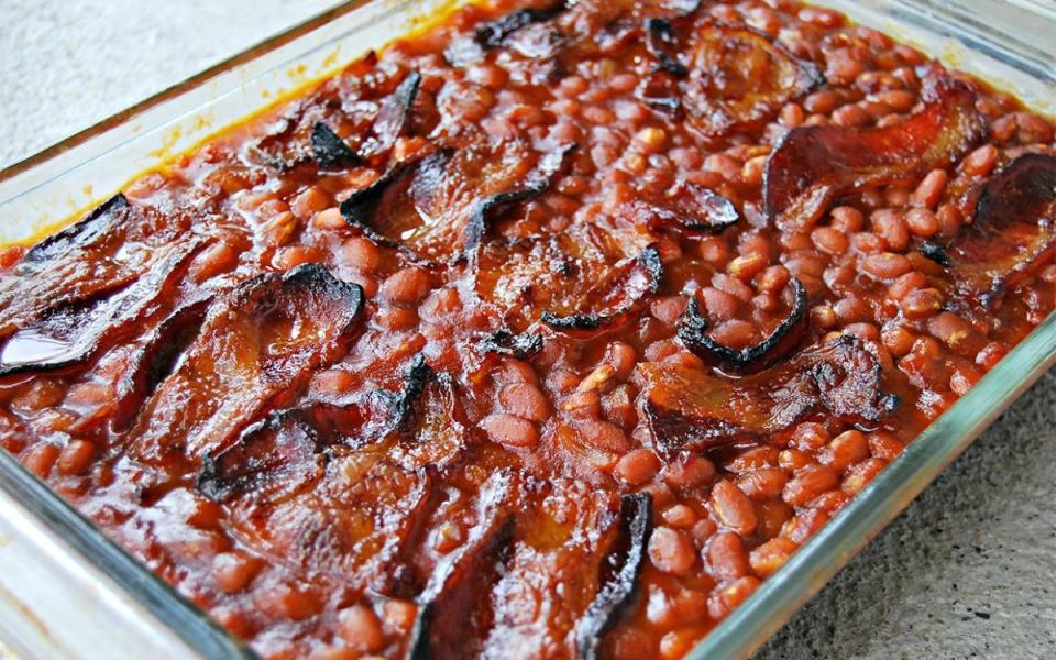 <p>Krista Marshall</p><p>These saucy, smoky and sweet beans are made better by bacon. Eat with sticky ribs and transcend to BBQ heaven.</p><p><strong>Get the recipe: </strong><strong><a href="https://parade.com/842731/kristamarshall/bacon-baked-beans/" rel="nofollow noopener" target="_blank" data-ylk="slk:Bacon Baked Beans;elm:context_link;itc:0;sec:content-canvas" class="link ">Bacon Baked Beans</a></strong></p>