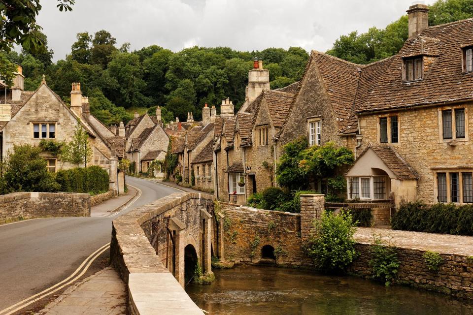 <p>Famed for its honey-coloured houses and quaint streets, Castle Combe in Wiltshire is often known as one of the prettiest streets in England. </p><p>Stay at the luxurious and dog-friendly Lucknam Park, just 10 minutes from Castle Combe with Country Living's exclusive hotel offer. </p><p><a class="link " href="https://countryliving.tripsmiths.com/offers/cotswolds-lucknam-park-dog-friendly-hotel-offer" rel="nofollow noopener" target="_blank" data-ylk="slk:BOOK NOW;elm:context_link;itc:0;sec:content-canvas">BOOK NOW</a></p>