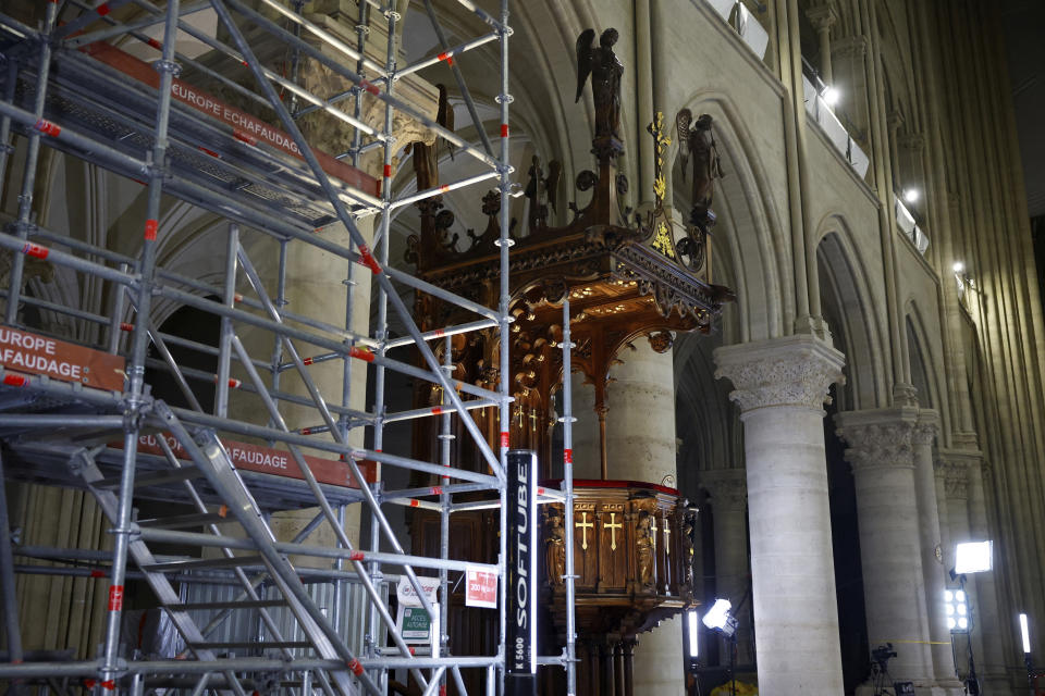 The nave of Notre Dame de Paris cathedral is pictured, Friday, Dec. 8, 2023 in Paris. French President Emmanuel Macron is visiting Notre Dame Cathedral on Friday, marking the one-year countdown to its reopening in 2024 following extensive restoration after the fire four years ago. (Sarah Meyssonnier, Pool via AP)