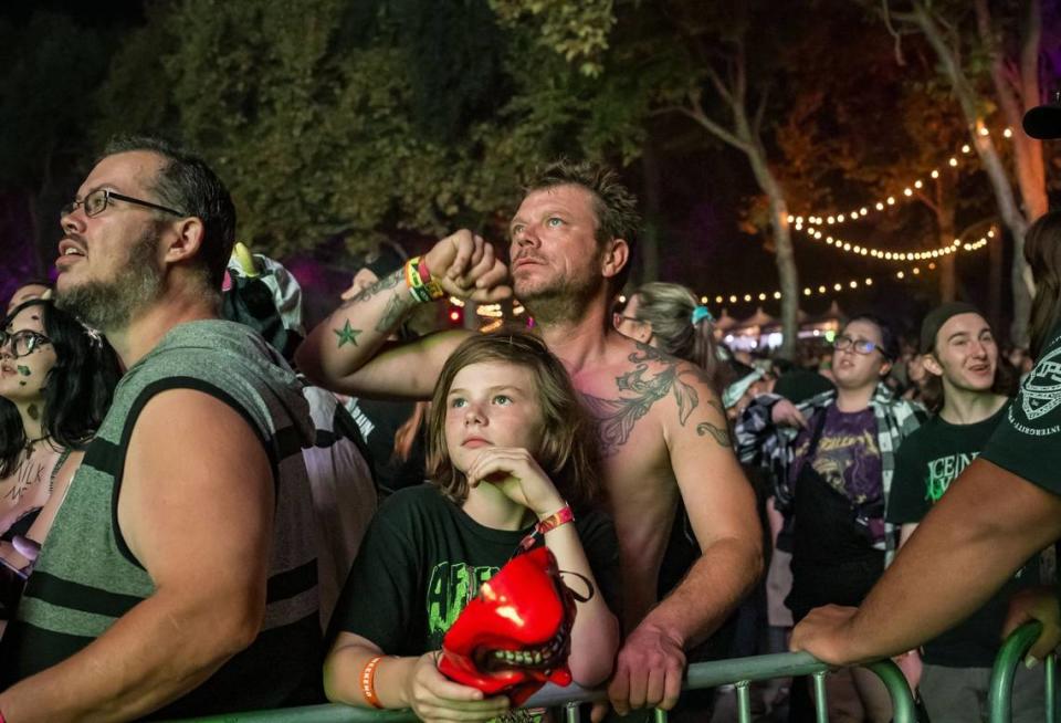 Ayden Bowers, 12, of Mendocino, attends his second Aftershock music festival with his father Robert Bowers, on the opening day Thursday.