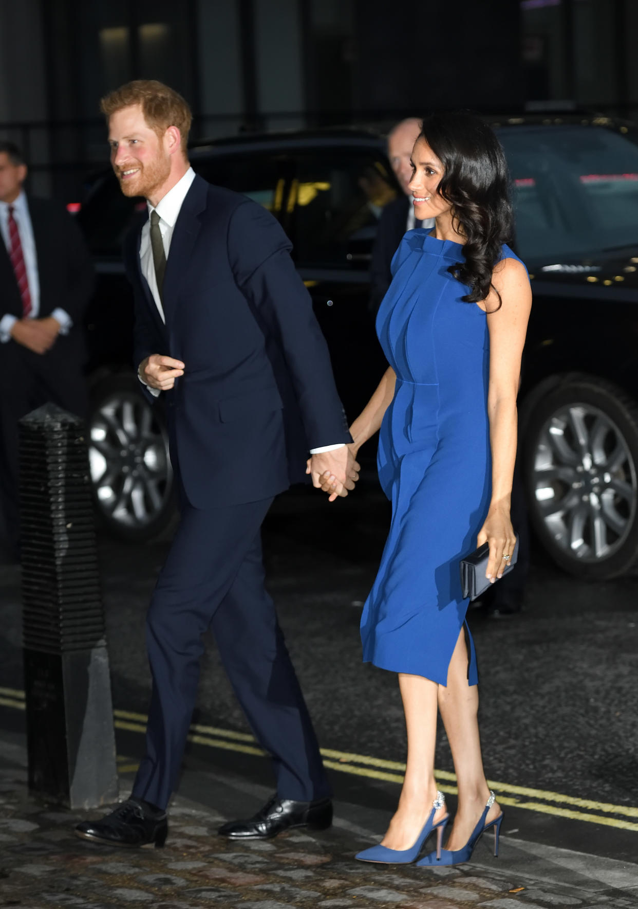 Prince Harry and the Duchess of Sussex arrive at the 100 Days of Peace in London. (Photo: Getty Images)