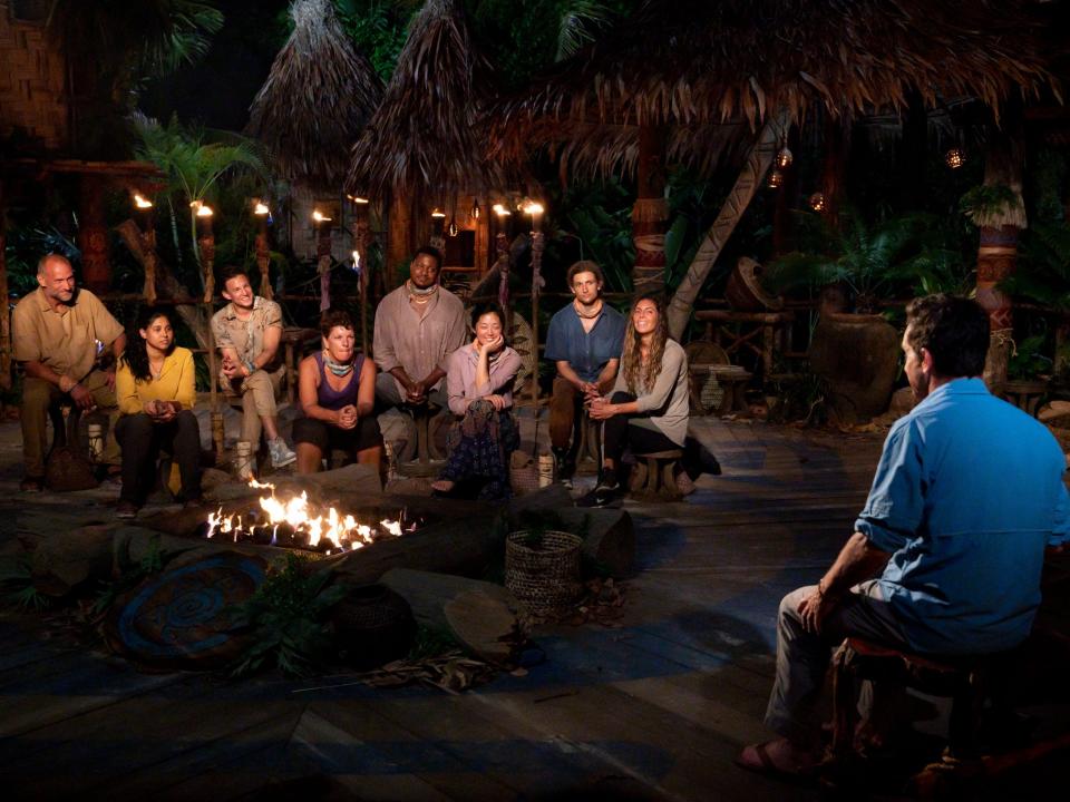 The cast of "Survivor: Island of the Idols" at tribal council with Jeff Probst