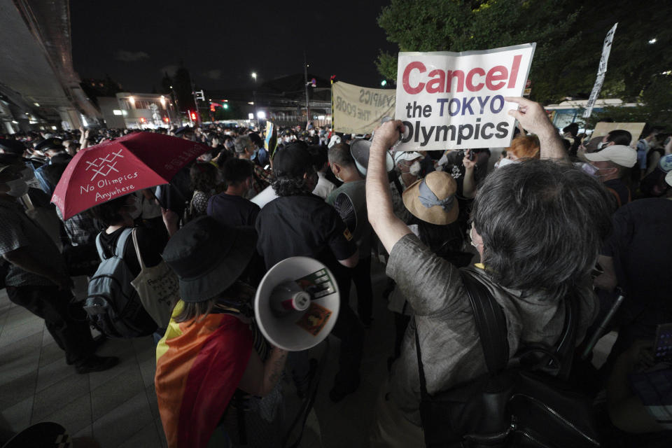 Anti-Olympic protestors demonstrate near the National Stadium in Tokyo, Japan where the opening ceremony of the Tokyo Olympics took place, Friday, July 23, 2021. / Credit: Kantaro Komiya / AP