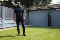 Lee Lawrence poses for a portrait at his house, in London, Wednesday, April 21, 2021. Lawrence's mother, Cherry Groce, was shot by police during a raid on her London home in 1985. She was left paralyzed from the waist down and died in 2011 after spending 26 years in a wheelchair. Her shooting triggered the 1985 Brixton riots, and her family have been fighting for justice ever since. (AP Photo/Alberto Pezzali)