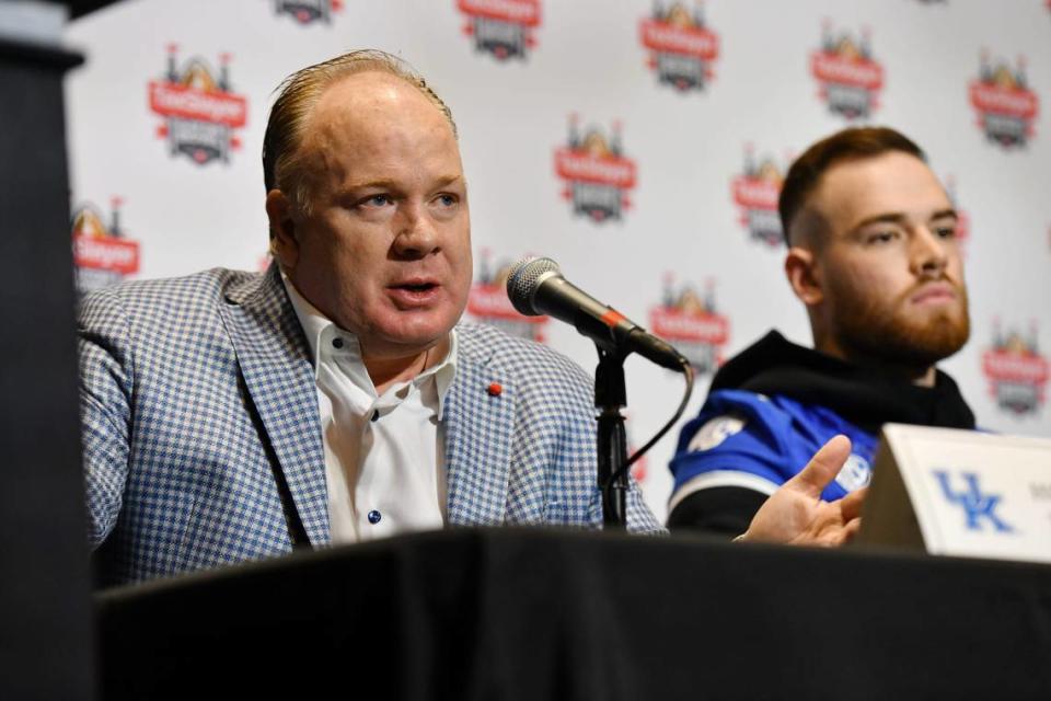 Kentucky Head Coach Mark Stoops addresses the media next to player Devin Leary during Thursday morning’s press conference. The Gator Bowl press conferences with Kentucky Head Coach Mark Stoops and Clemson Head Coach Dabo Swinney was held Thursday, December 28, 2023, in the east club at EverBank Stadium the day before the the historic college football bowl game in Jacksonville, Florida.