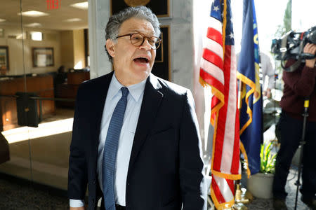 U.S. Senator Al Franken talks to the media outside his office on Capitol Hill in Washington, U.S., November 27, 2017. REUTERS/Yuri Gripas