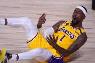 Los Angeles Lakers' Kentavious Caldwell-Pope (1) calls for a foul against the Denver Nuggets after scoring a basket during the second half an NBA conference final playoff basketball game, Friday, Sept. 18, 2020, in Lake Buena Vista, Fla. (AP Photo/Mark J. Terrill)