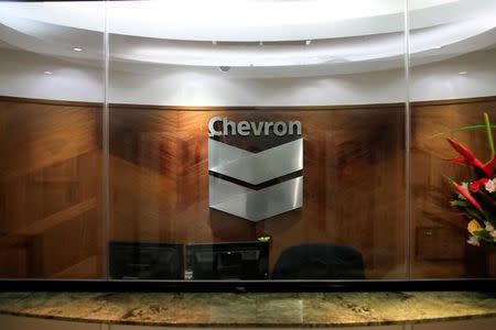 The logo of Chevron is seen at the company's office in Caracas, Venezuela April 25, 2018. REUTERS/Marco Bello