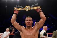 Boxing - Nick Blackwell v Chris Eubank Jnr British Middleweight Title - The SSE Arena, Wembley - 26/3/16 Chris Eubank Jnr celebrates with the belt after the fight Action Images / Adam Holt