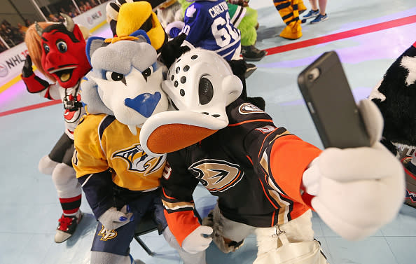 NASHVILLE, TN - JANUARY 28: NHL Mascots Wildwing and Gnash pose for a selfie during a game of musical chairs in the Mascot Showdown at the 2016 NHL Fan Fair at the Music City Center during the NHL Honda All-Star week in Nashville, Tennessee on January 28, 2016. (Photo by John Russell/NHLI via Getty Images)