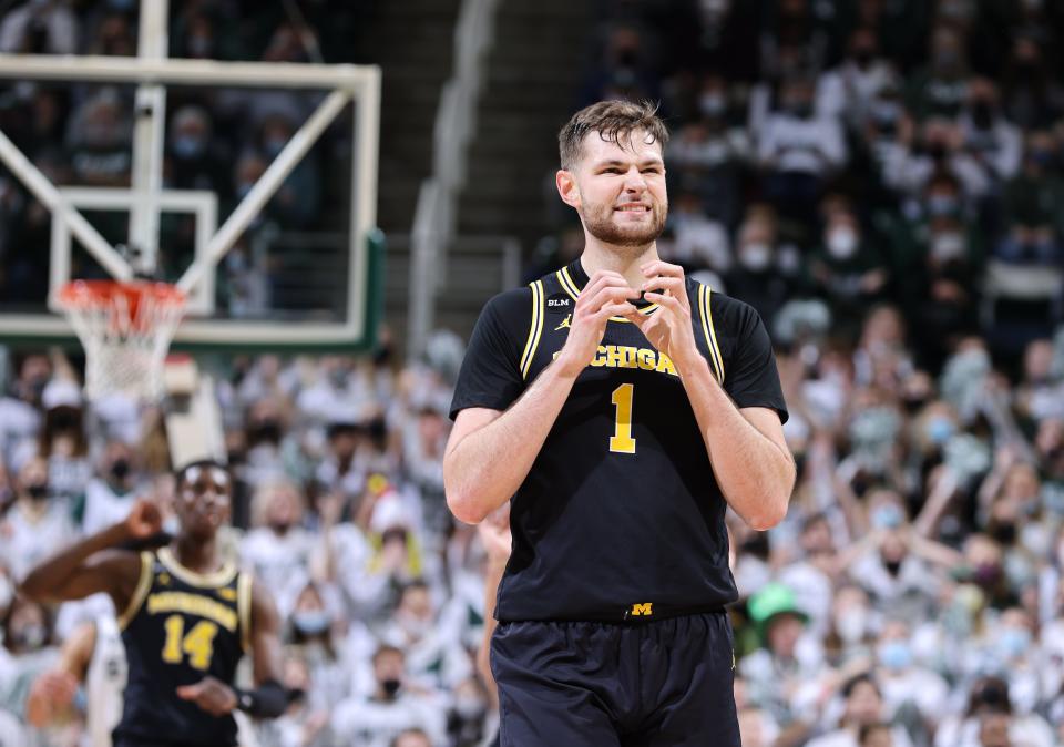 Michigan's Hunter Dickinson reacts in the first half vs. Michigan State at Breslin Center on Jan. 29, 2022 in East Lansing.