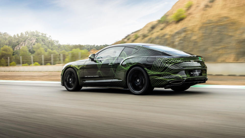 Piloting the still-disguised hybrid Bentley Continental GT Speed.