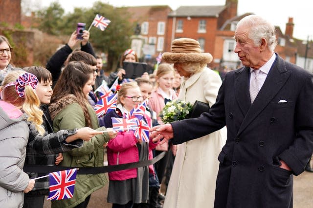 Charles and Camilla speak to schoolchildren at Colchester Castle 