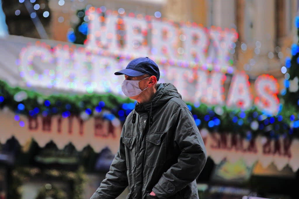 Christmas shoppers walk through the centre of Cardiff, Wales (Ben Birchall/PA) (PA Wire)