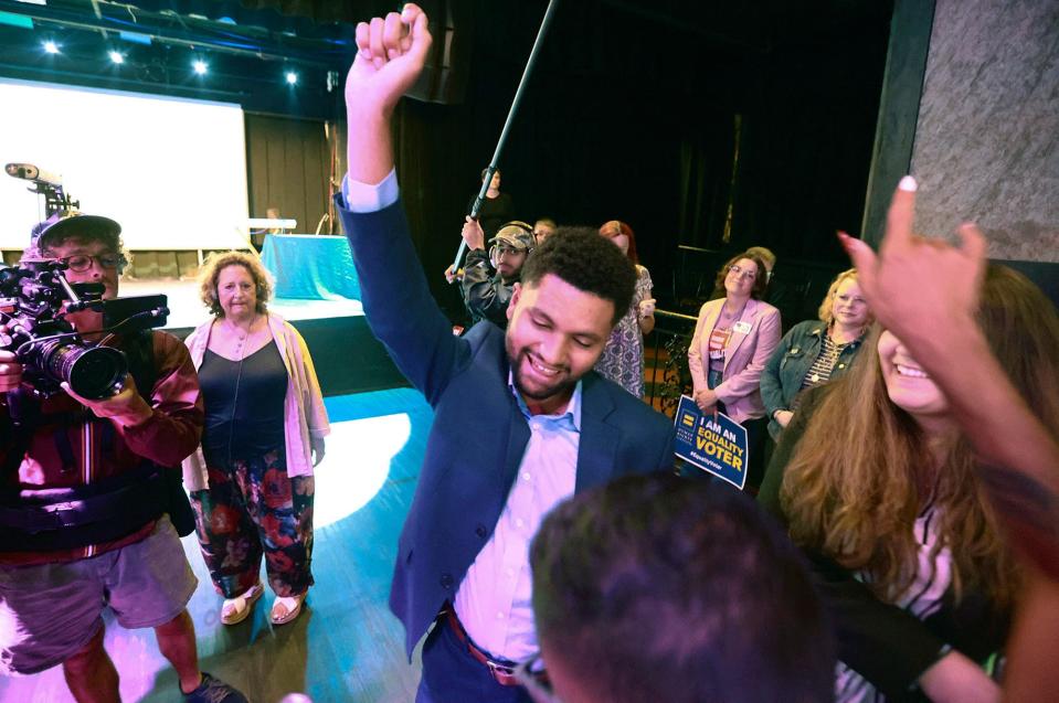 Maxwell Frost dances with supporters during a party at The Abbey in Orlando, Fla., on Tuesday.