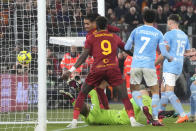 Lazio's goalkeeper Ivan Provedel fails to save a goal that was later disallowed during the Italian Serie A soccer match between Lazio and Roma at Rome's Olympic stadium, Sunday, March 19, 2023. (AP Photo/Gregorio Borgia)