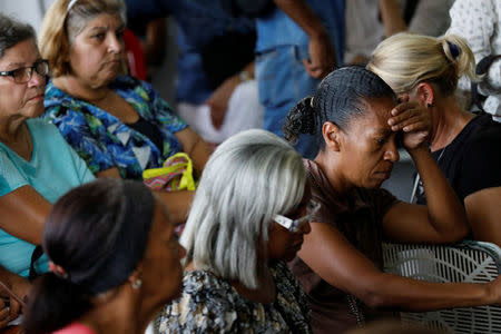 Supporters of Carlos Ocariz, the losing candidate of the Venezuelan coalition of opposition parties (MUD) for the Miranda state governor office, attend to his news conference in Caracas, Venezuela, October 16, 2017. REUTERS/Carlos Garcia Rawlins