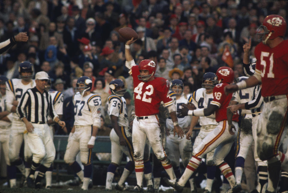 Safety Johnny Robinson celebrates with the ball during Super Bowl IV. (Getty Images) 