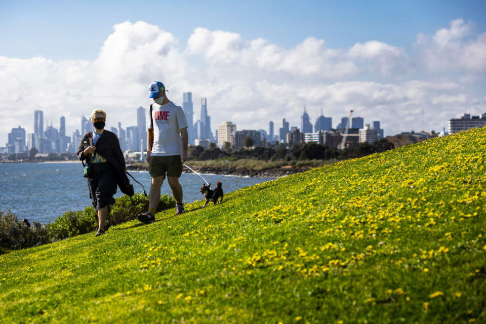 People walk along Point Ormond in Elwood in Melbourne, Australia. 