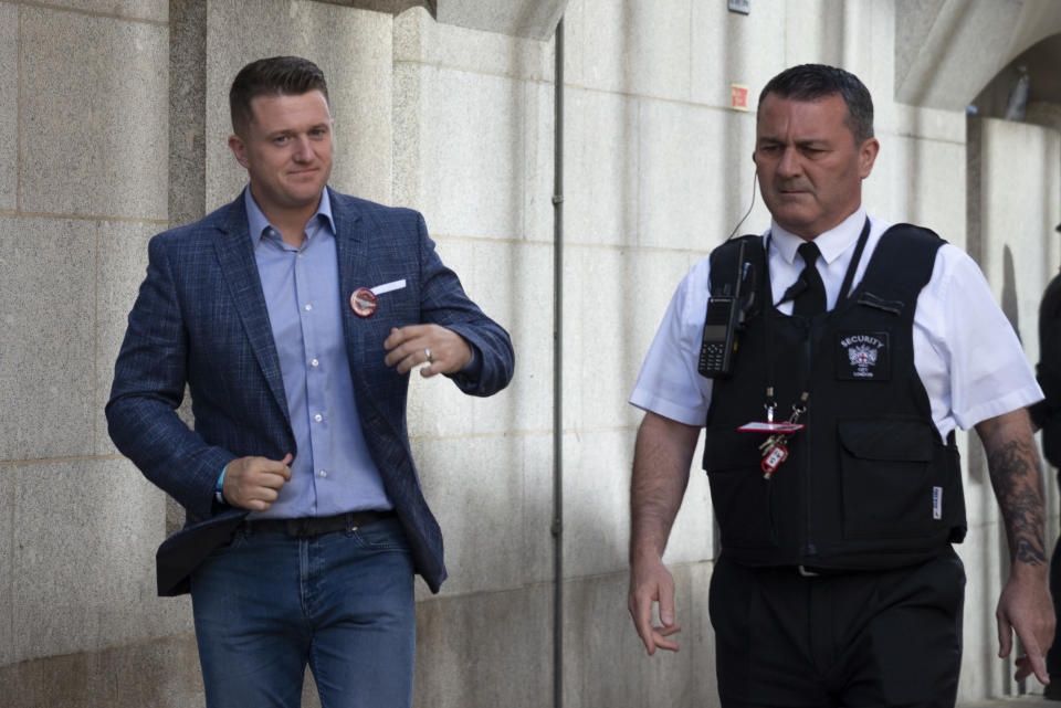 Tommy Robinson real name Stephen Yaxley-Lennon seen on the left arrives at the Old Bailey in London,United Kingdom on July 5, 2019. Tommy Robinson attends the Old Bailey for a committal hearing for alleged contempt of court. (Photo by Claire Doherty/Sipa USA)