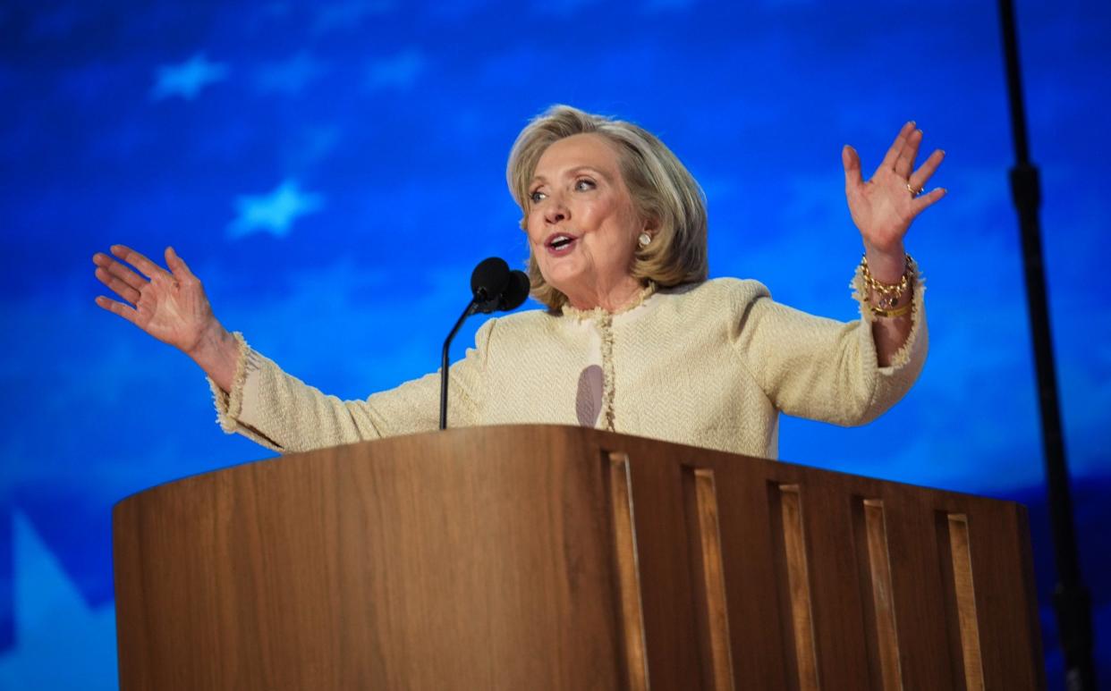 Hillary Clinton speaks onstage during the first day of the Democratic National Convention at the United Center