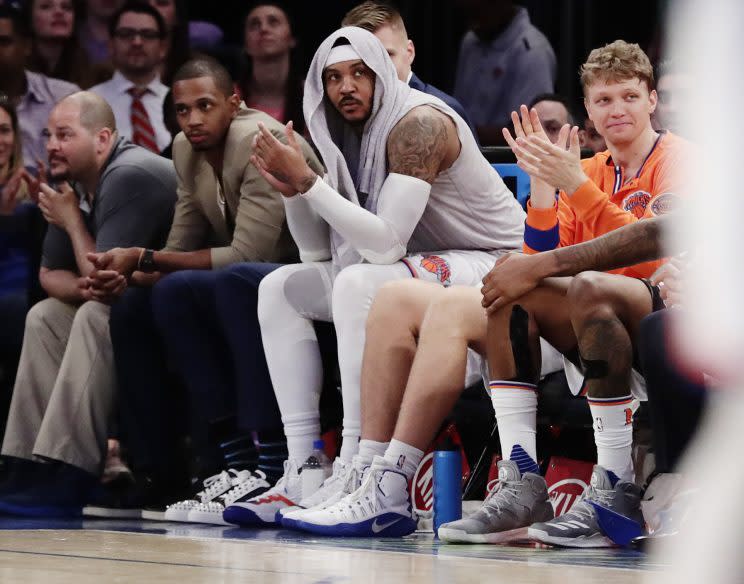 The Carmelo Anthony issue is still hanging over the Knicks. (AP)