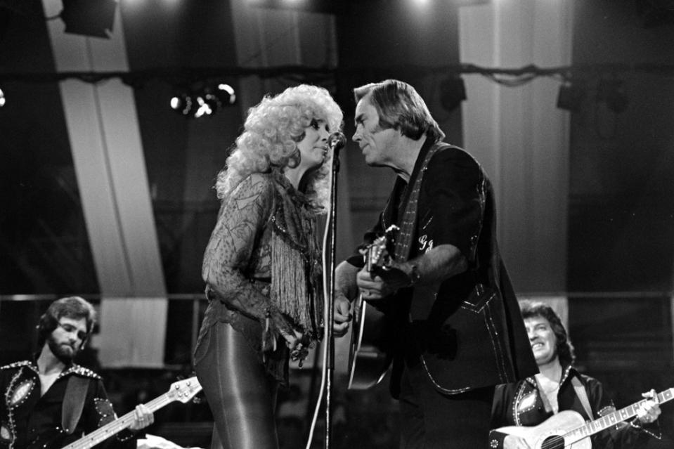 Taurus = stand by your man, even — and especially — when you should run in the opposite direction. Case in point: Tammy Wynette, above, with George Jones. Getty Images