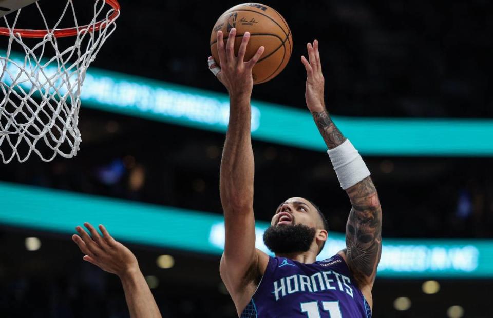 Hornets guard Cody Martin takes the ball tp the hoop during the game against the Spurs at Spectrum Center on Friday, January 19, 2024. Melissa Melvin-Rodriguez/mrodriguez@charlotteobserver.com