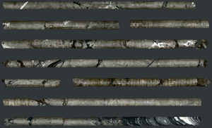 Image 1: Core from drill hole NB22-019, 164.3 m to 171.9 m, massive sulphide (pyrite-sphalerite) replacing a sequence of black mudstone and barite layers. From within the intersection 159.86-171.41 m (11.5 m) that graded 10.91% zinc, 0.31% lead, and 43.5 g/t silver (Table 1). Image is a composite of high-resolution images taken during core scanning. Core is HQ3 (61.1 mm diameter).
