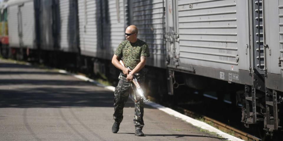 Ukraine train Malaysia plane bodies