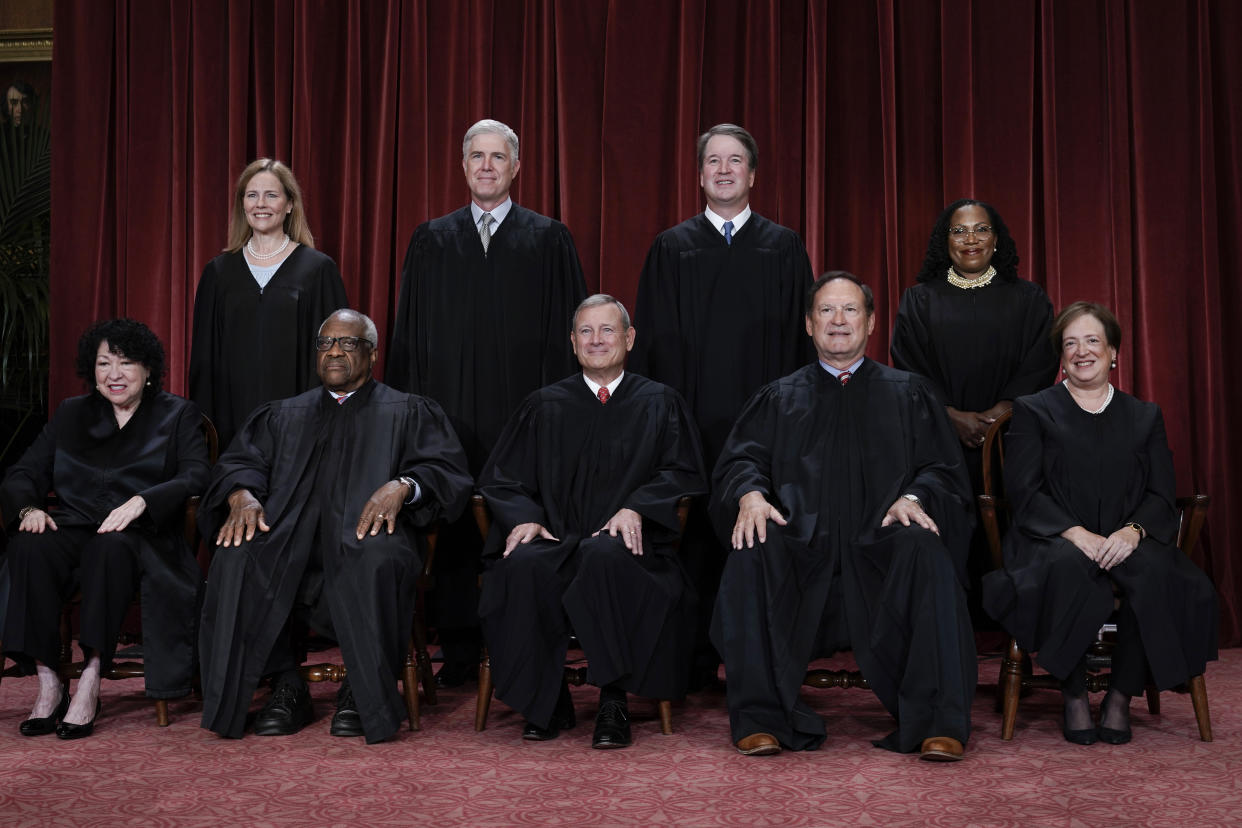 Members of the Supreme Court sit for a new group portrait following the addition of Associate Justice Ketanji Brown Jackson, at the Supreme Court building in Washington, Oct. 7, 2022. Bottom row, from left, Associate Justice Sonia Sotomayor, Associate Justice Clarence Thomas, Chief Justice of the United States John Roberts, Associate Justice Samuel Alito, and Associate Justice Elena Kagan. Top row, from left, Associate Justice Amy Coney Barrett, Associate Justice Neil Gorsuch, Associate Justice Brett Kavanaugh, and Associate Justice Ketanji Brown Jackson. (J. Scott Applewhite/AP)