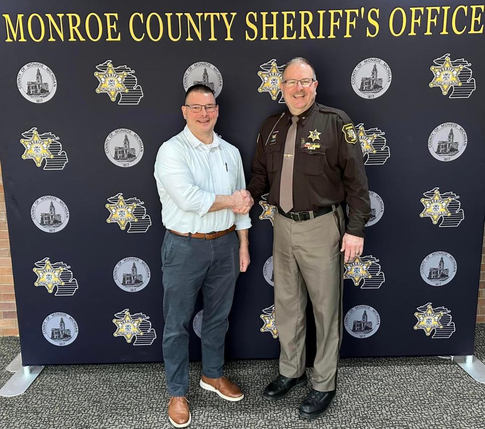 Monroe County Undersheriff Jeff Pauli, left, is pictured with Sheriff Troy Goodnough upon Pauli's retirement from the sheriff's office.