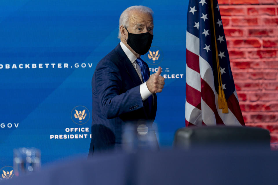 President-elect Joe Biden departs a news conference after introducing his nominees and appointees to economic policy posts at The Queen theater, Tuesday, Dec. 1, 2020, in Wilmington, Del. (AP Photo/Andrew Harnik)