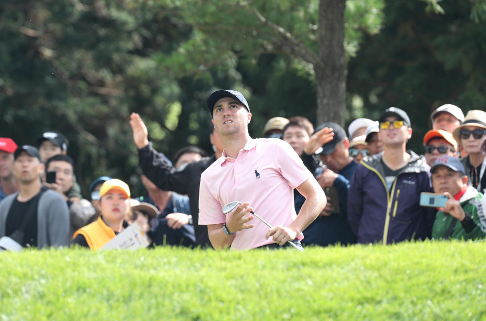 Justin Thomas of the United States watches his shot on the 17th hole during the final round of the CJ Cup PGA golf tournament at Nine Bridges on Jeju Island, South Korea, Sunday, Oct. 20, 2019. (Park Ji-ho/Yonhap via AP)