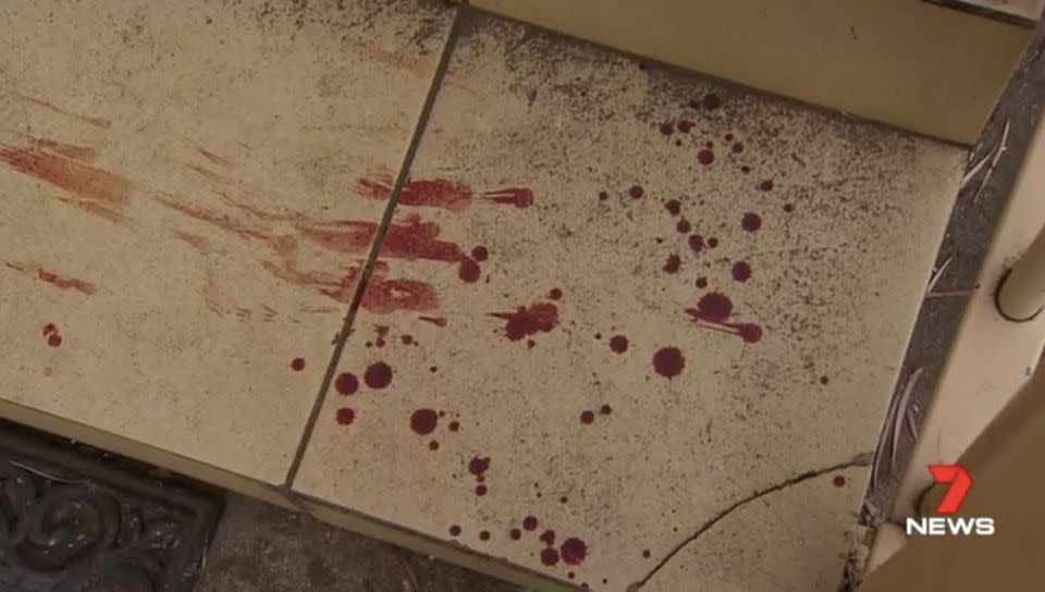 A trail of blood was left on the front porch of this Para Hills home. Source: 7 News